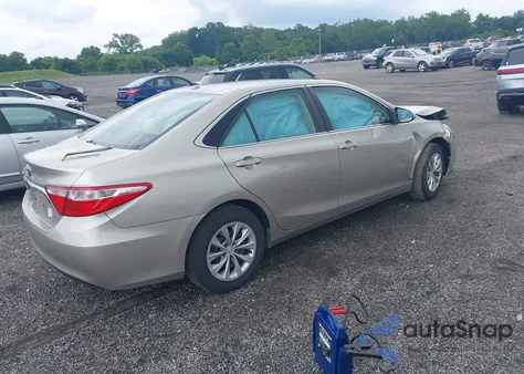 2016 Toyota Camry Le z USA, uszkodzony, nr VIN 4T4BF1FK9GR528887